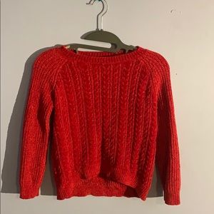 Red knitted sweater